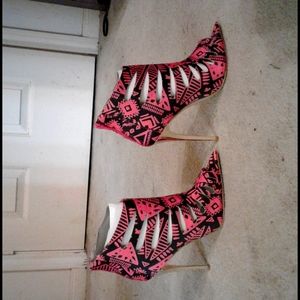 Pink and black high heel shoes